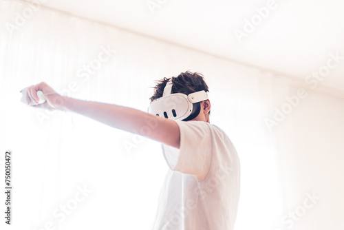 Canvas Print Teenage boy playing oculus console Meta Quest 3