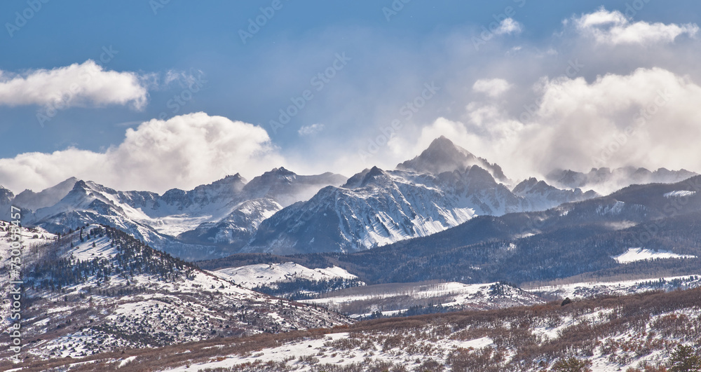 snow covered mountains on Dallas Divide in a wind storm 