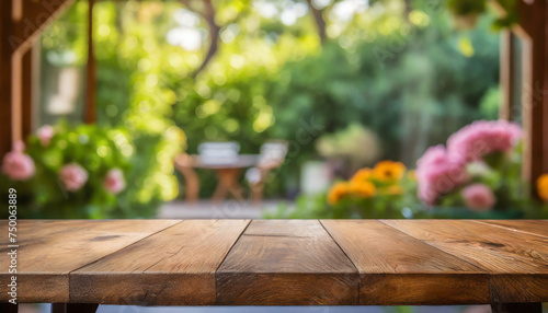 Empty wooden table. Summer time. Blurred backyard, green garden. Mock up