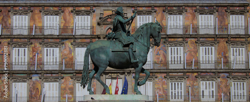 Madrid Plaza Mayor. Estatua ecuestre de Felipe III y decoración mural. España photo