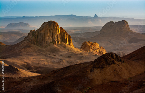 Hoggar landscape in the Sahara desert, Algeria. A view of the mountains and basalt organs that stand around the dirt road that leads to Assekrem. © Louis-Michel DESERT
