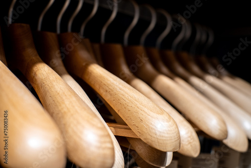 Wooden hangers for sale on a rack