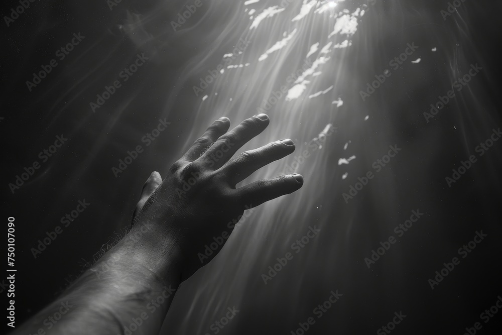 Helping Hand Reaching Out from the Dark Abyss, Symbolizing Salvation and Redemption Concept Helping Hand Reaching Out from the Dark Abyss, Symbolizing Salvation and Redemption Concept
