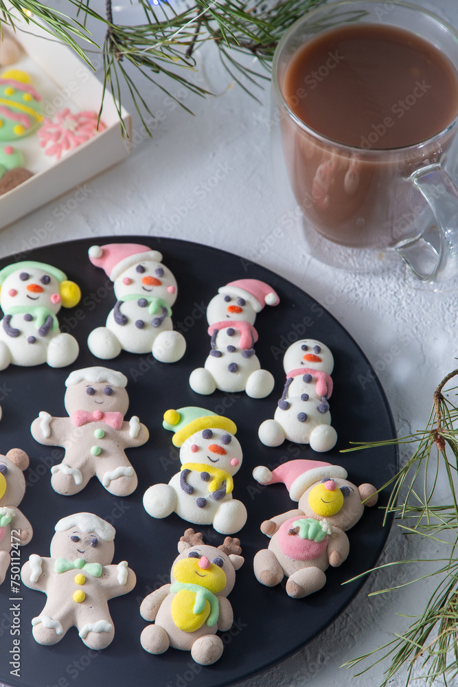 Christmas marshmallows. Winter candy. Sweet food in december. Snowman and Santa Claus Christmas marshmallows. Winter candy. Sweet food in december. Snowman and Santa Claus