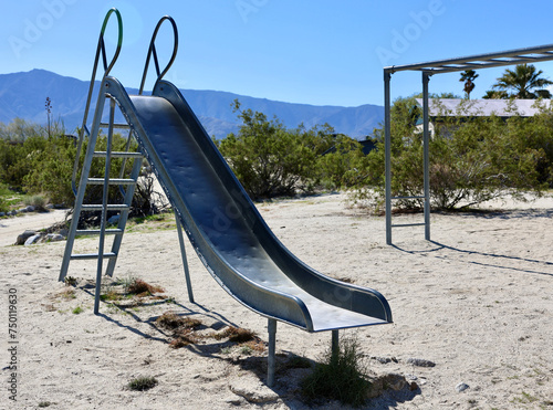 1950s era metal playground equipment in the desert