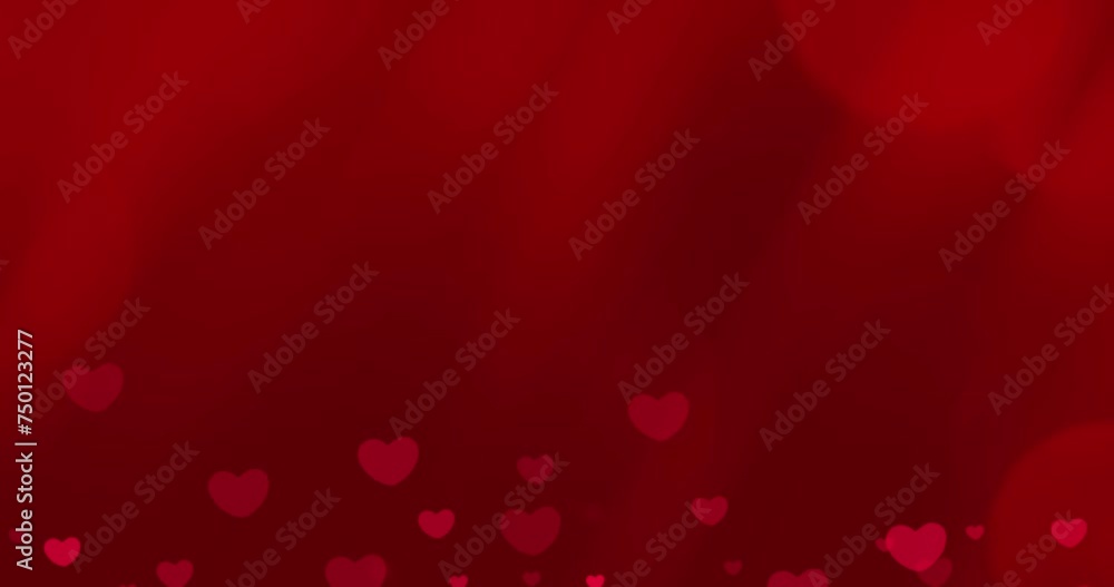 Animated romantic red hearts on red background with bokeh effects for Valentine's day and wedding concept Animated romantic red hearts on red background with bokeh effects for Valentine's day and wedding concept