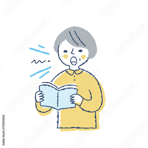 声を出して本を読んでいる女性