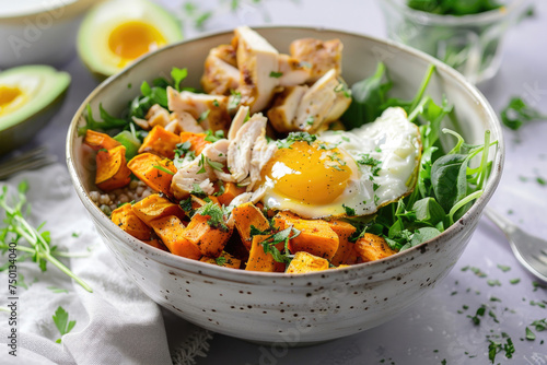 A nutritious and satisfying breakfast bowl featuring sweet potato, chicken and egg