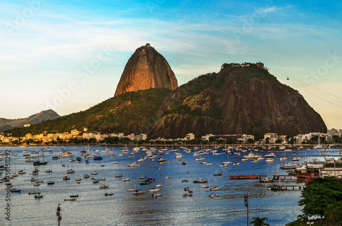 
A breathtaking view of the iconic Sugarloaf Mountain unfolds before you from the panoramic rooftop of Botafogo Beach Shopping at Rio de Janeiro, Brazil.
