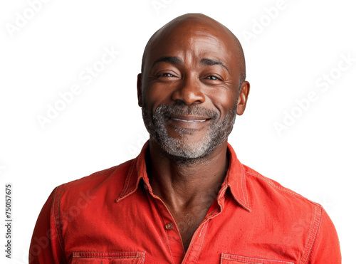 a bald man with a bright smile, wearing a vibrant red shirt