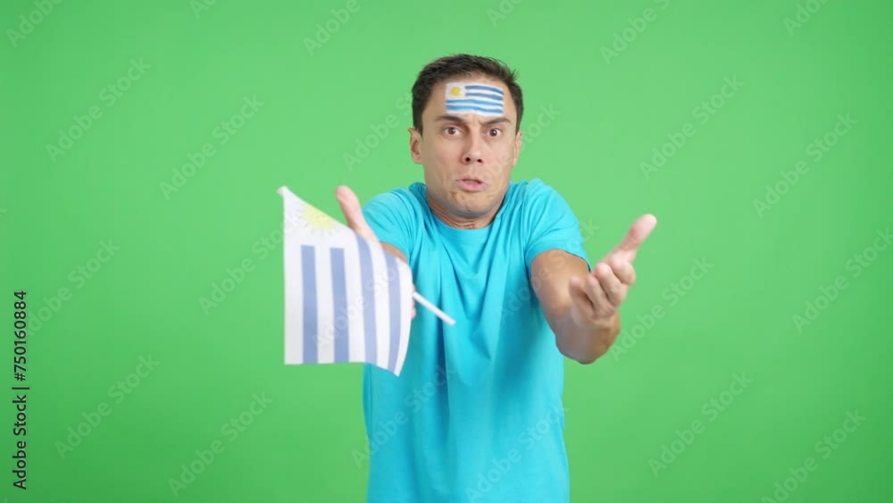 Man Cheering for Uruguay, angry with the decision of referee Man Cheering for Uruguay, angry with the decision of referee