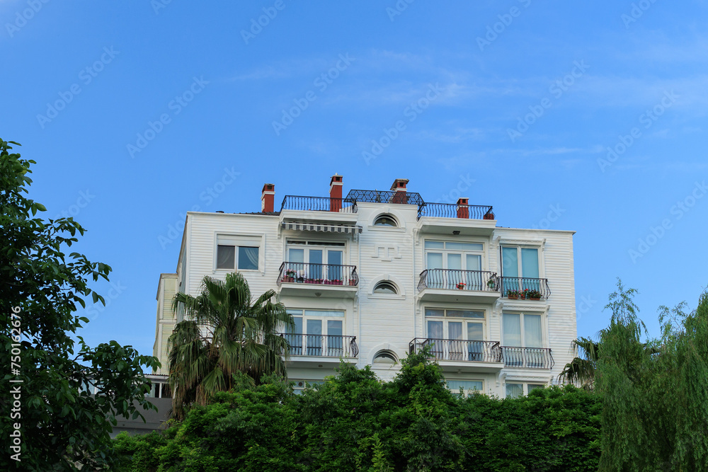 View of buildings and houses in public places in Turkey, sunny summer day