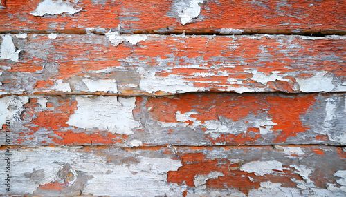 Light blue red and green weathered wooden background with cracked paint.