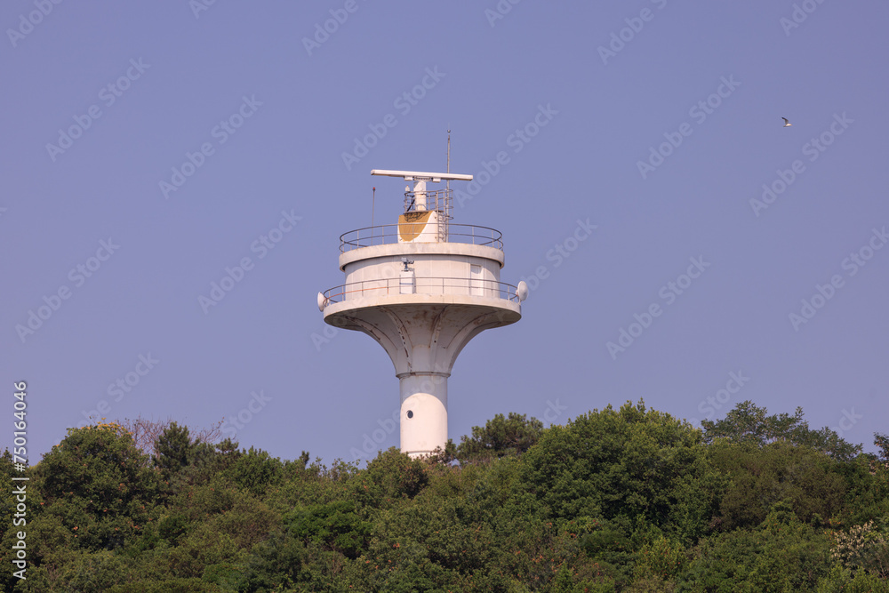 View of tower buildings and houses in public places in Turkey, blue sky and sunny summer day View of tower buildings and houses in public places in Turkey, blue sky and sunny summer day