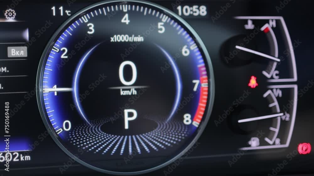Car tachometer engine revving needle indicates redline speed vibration. Performance Racing Car Dashboard. Tachometer Showing Performance. Dashboard in the car. The car pics up speed, tachometer. Car tachometer engine revving needle indicates redline speed vibration. Performance Racing Car Dashboard. Tachometer Showing Performance. Dashboard in the car. The car pics up speed, tachometer.
