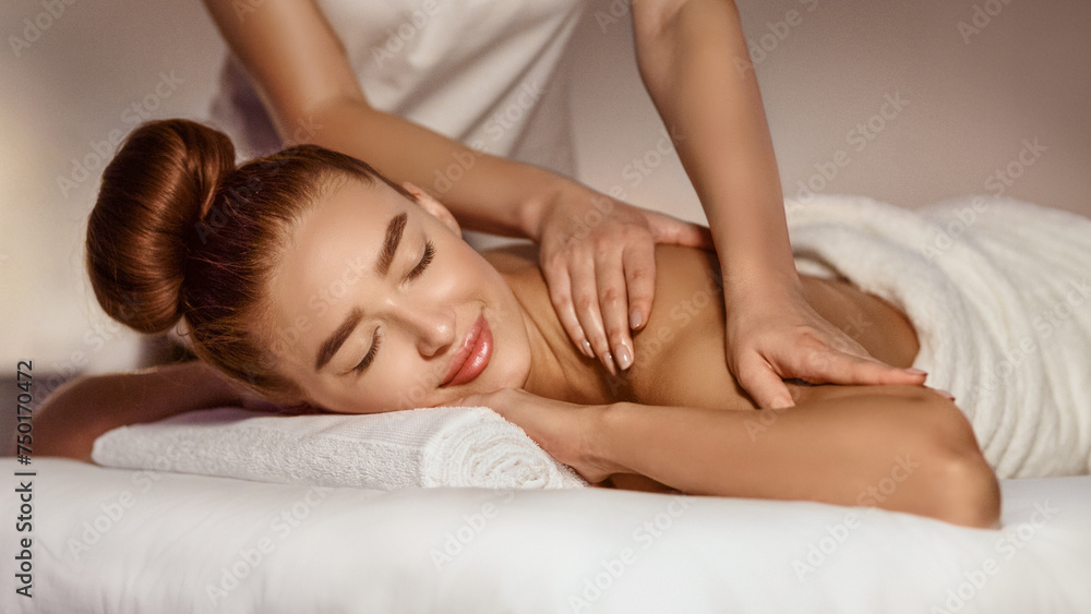 Body Care. Woman Enjoying Shoulder Massage With Closed Eyes Body Care. Woman Enjoying Shoulder Massage With Closed Eyes