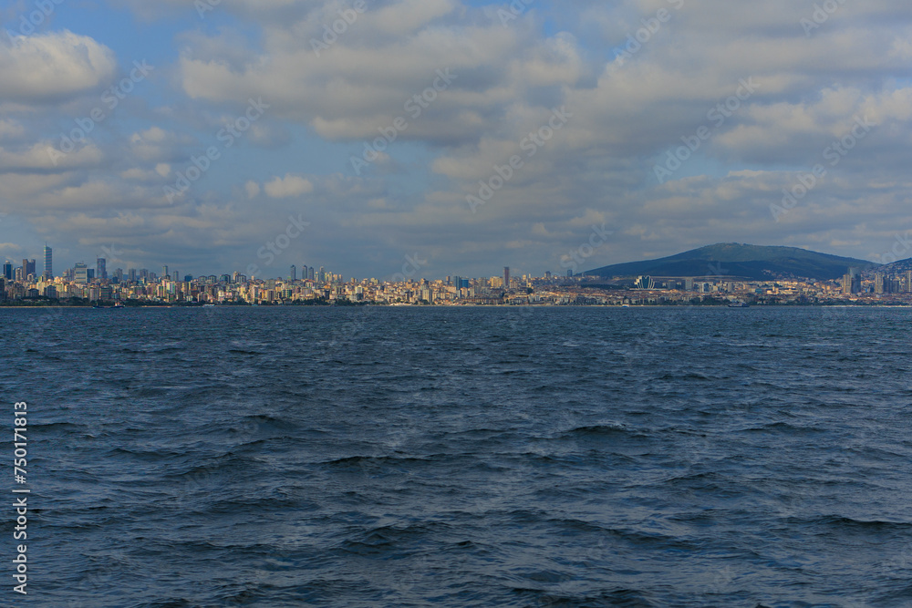 View from the water to buildings in the city of Istanbul 