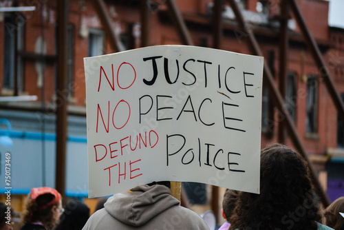 Obraz na płótnie Defund the Police sign at a protest. w salonie