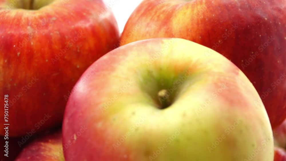 Gyration red ripe apples close-up. Gyration red ripe apples close-up.