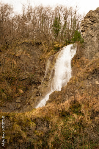 La cascata di Vidiciatico in appennino in una giornata piovosa d'inverno photo