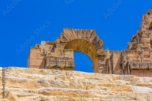 Details of the amphitheater in El Jem in Tunisia. The amphitheatre of El Jem is the only one in the Roman world to be built entirely from dressed stone, without the use of bricks.  photo