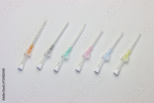 Intravenous catheter aligned by size in a white background 