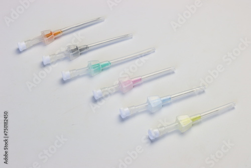 Intravenous catheter aligned by size in a white background 