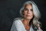 Elegant portrait of a senior woman with graceful grey hair Radiating confidence and beauty. inspirational mature beauty concept