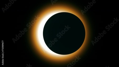 Total Solar Eclipse silhouette. Moon passing in front of the sun, creating a total solar eclipse and revealing the sun's corona.
 photo