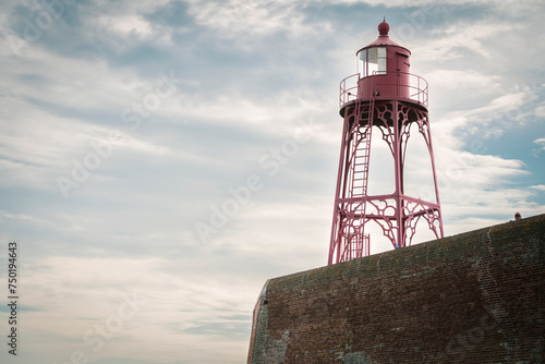Lighthouse on fortifications and harbor head of Vlissingen in the Privince Zeeland, Netherlands photo