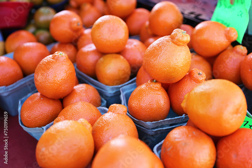 Stacks of Fresh Ripe Tangelo Oranges at the Farmers Market