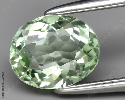 Fotografie natural green beryl gem on the background