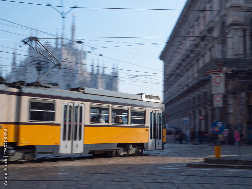 tram in the city traffic Milan, Italy