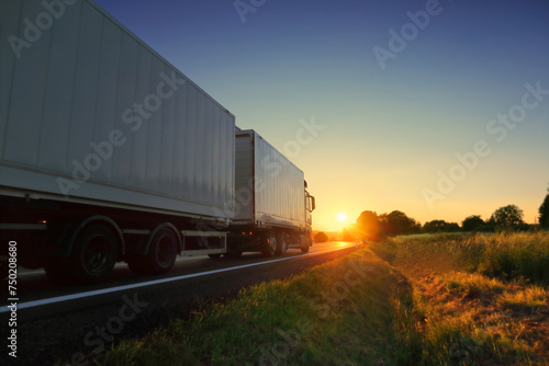 Truck on the road at sunset
