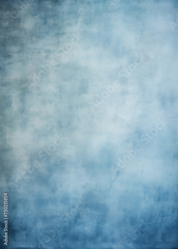 Abstract dusty blue blurred background for portrait. Portrait backdrop for studio. Empty wall.