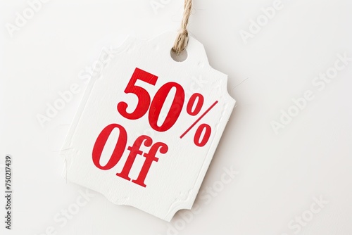 Hanging white tag with 50% OFF in red photo