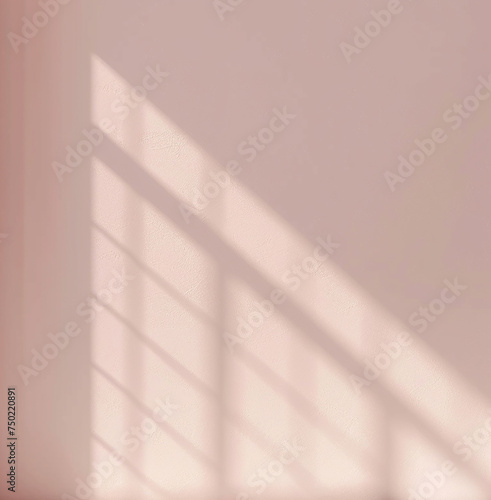 Neutral pink wall of the room with a window shadow background