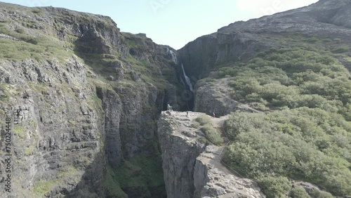 Glymur's Hidden Landscape Power A Waterfall Journey in Iceland 4K photo