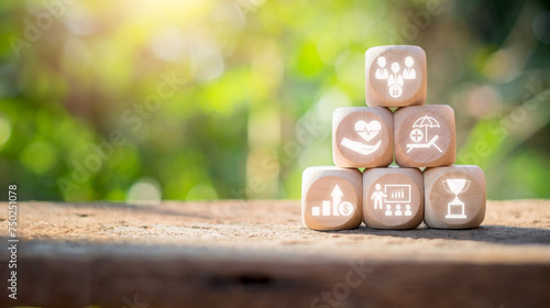 Employee benefits concept, Wooden block on desk with employee benefits icon on virtual screen.