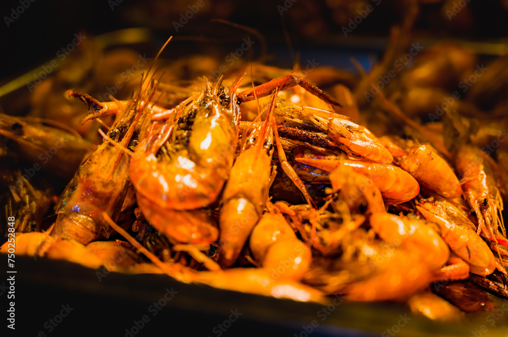 Fried shrimps with salt and pepper on a food stall Fried shrimps with salt and pepper on a food stall