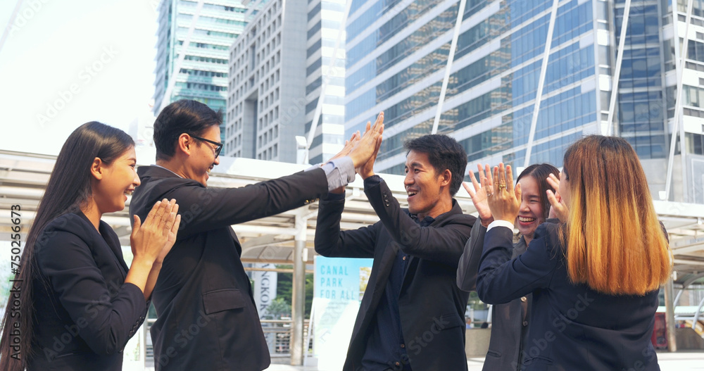 Obraz premium Diversity Teamwork business people friendship holding hands together. Multiethnic Businesspeople teams Solidarity partner. Group of teamwork high five team together success tag team winner partner