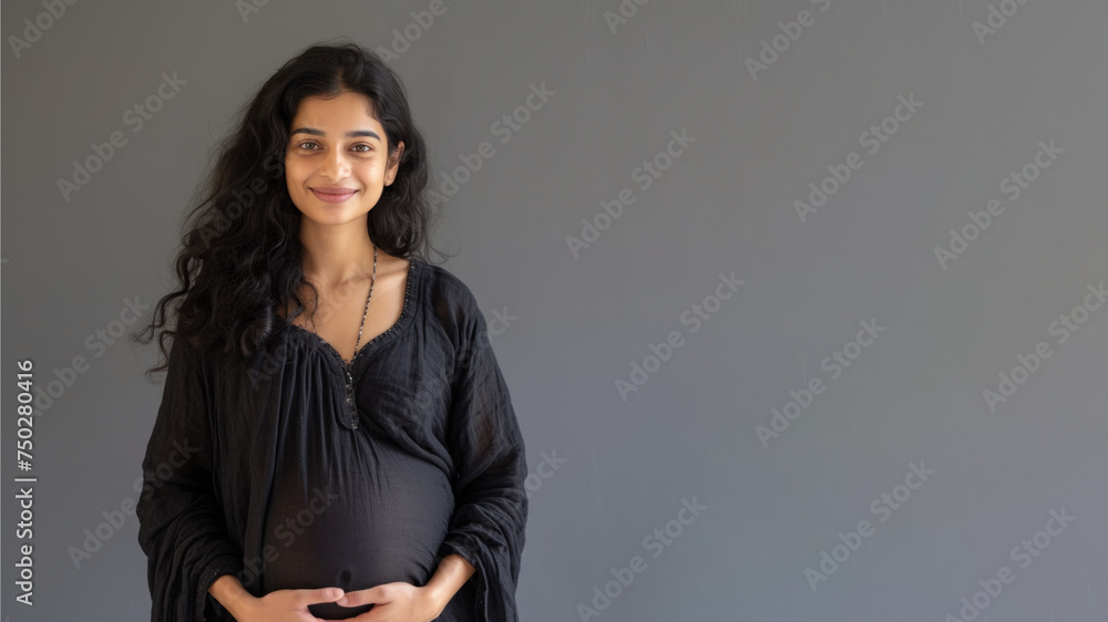 Indian pregnant woman with pregnancy belly, in soft black clothes - obrazy, fototapety, plakaty 
