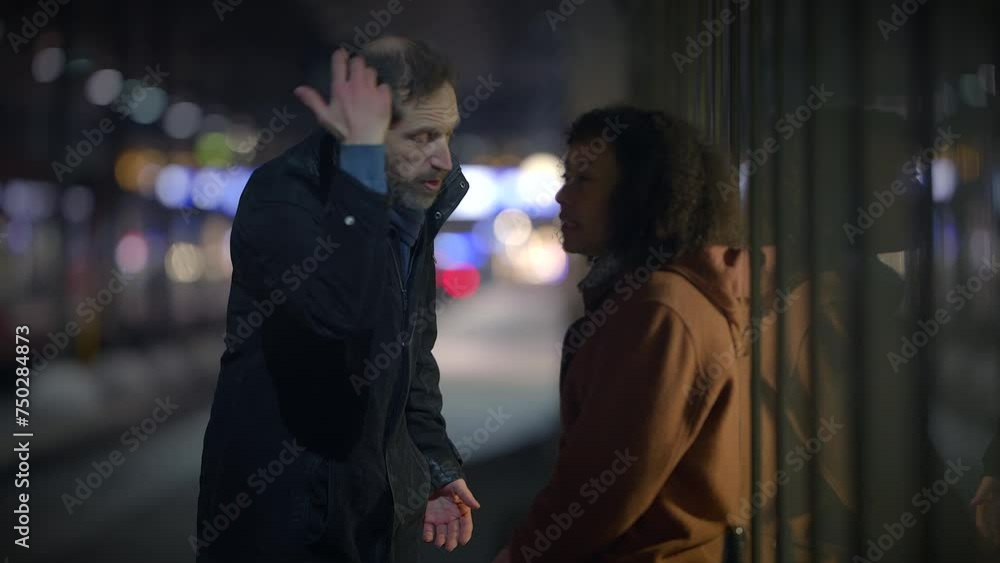Woman with Curly Hair Smoking Cigarette While Arguing with Upset Husband Woman with Curly Hair Smoking Cigarette While Arguing with Upset Husband