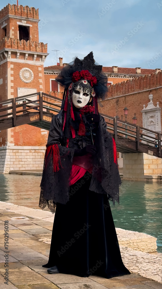 Venice Carnival. People in Venetian carnival masks and costumes on streets of Venice, Italy, Europe February 10, 2024