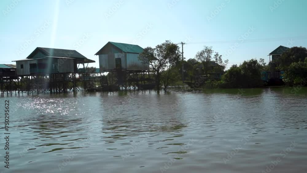 boat trip on the River in Cambodia. Fishing villages and houses on the water boat trip on the River in Cambodia. Fishing villages and houses on the water