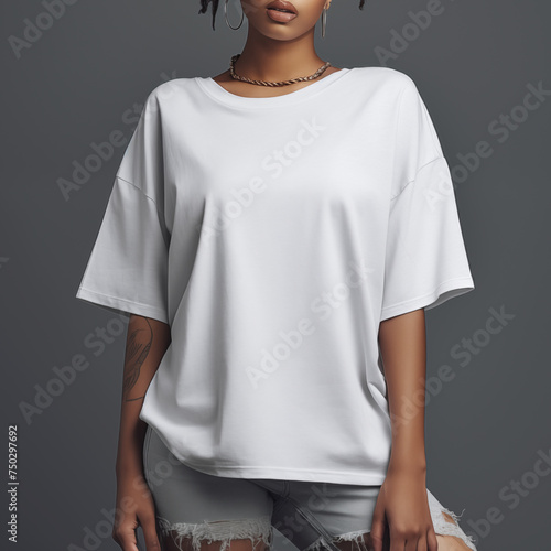 Black woman in white oversize t-shirt on gray background for clothing mockup