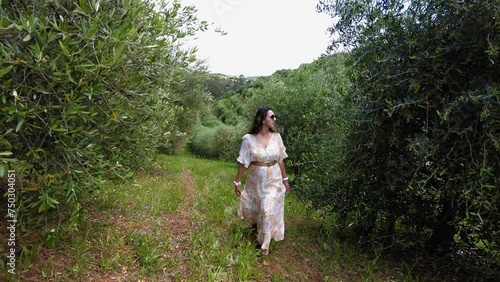 Female Wearing Dress Walking And Enjoying Vineyard Landscape In Constantia, Cape Town, South Africa - Pullback photo