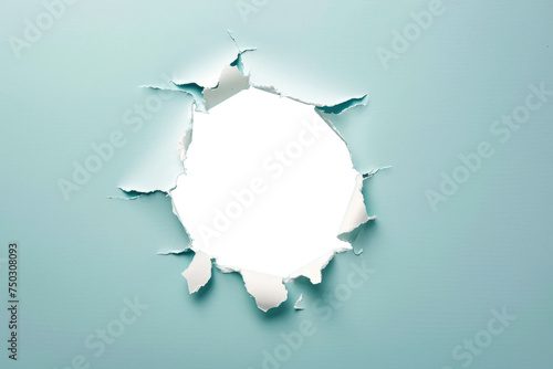 a hole of paper ripped as a circle hole in center