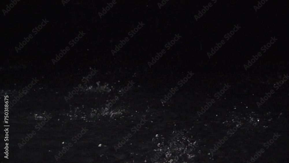 Super Slow Motion video of rain drops at 1000 fps on black background. Waterfall at 1000 frames per second. Weather concept super slow motion shot on high speed camera 1000 fps. Super Slow Motion video of rain drops at 1000 fps on black background. Waterfall at 1000 frames per second. Weather concept super slow motion shot on high speed camera 1000 fps.