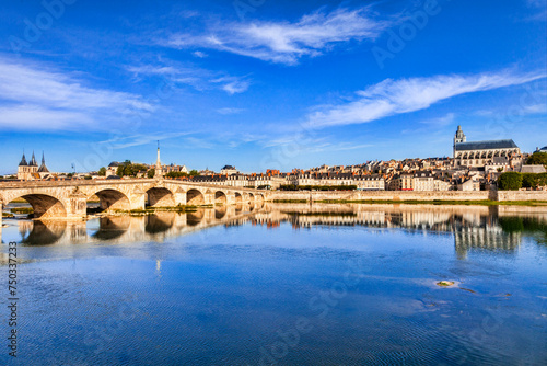 Blois Loire Valley France, the old town and bridge on the banks of the Loire at twilight.